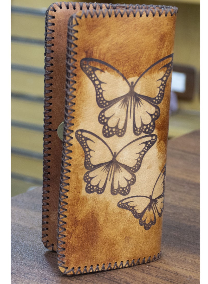 ✨ Handmade Genuine Leather Wallet – Timeless Elegance & Function 100% genuine leather – handcrafted Artistic laser engraving Magnetic clasp 8 card slots 2 zippered pockets + 2 additional compartments Size: 9×20 cm 🛒 Available now on Noon  From Holy of Holies Store – where style meets craftsmanship  - Image 1