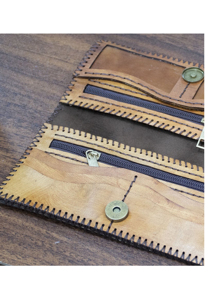 ✨ Handmade Genuine Leather Wallet – Timeless Elegance & Function 100% genuine leather – handcrafted Artistic laser engraving Magnetic clasp 8 card slots 2 zippered pockets + 2 additional compartments Size: 9×20 cm 🛒 Available now on Noon  From Holy of Holies Store – where style meets craftsmanship  - Image 2