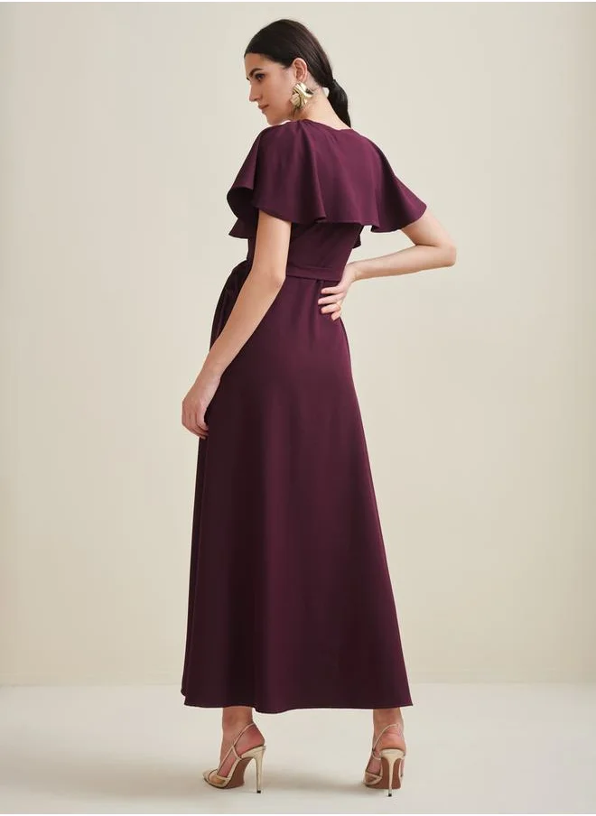 فيميلا Frill Cape Sleeve Wrap Around Maxi Dress by Styli