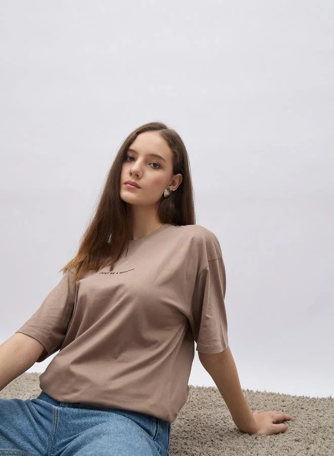 Styli Styli Women Beige Slogan Print Short Sleeve Oversized T-Shirt