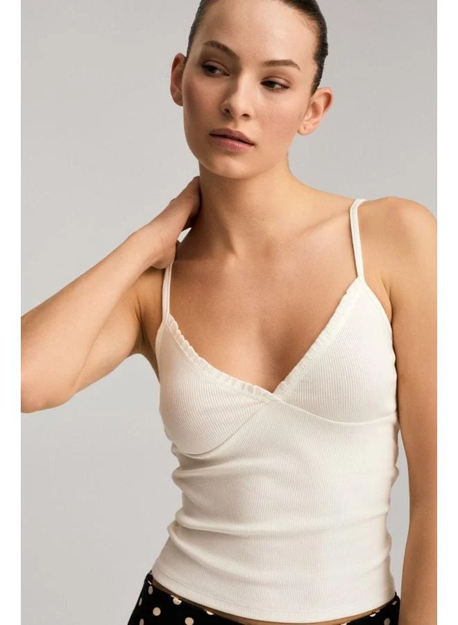 Ethiquet NIA Women's Organic Cotton Soft and Flexible Fabric White Tank Top with Ruffle Details.
