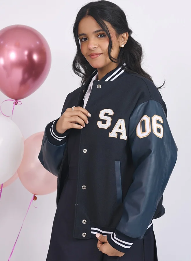 عبايات حوراء جاكيت تخرج بأكمام جلد مع إمكانية تطريز الاسم وسنة التخرج