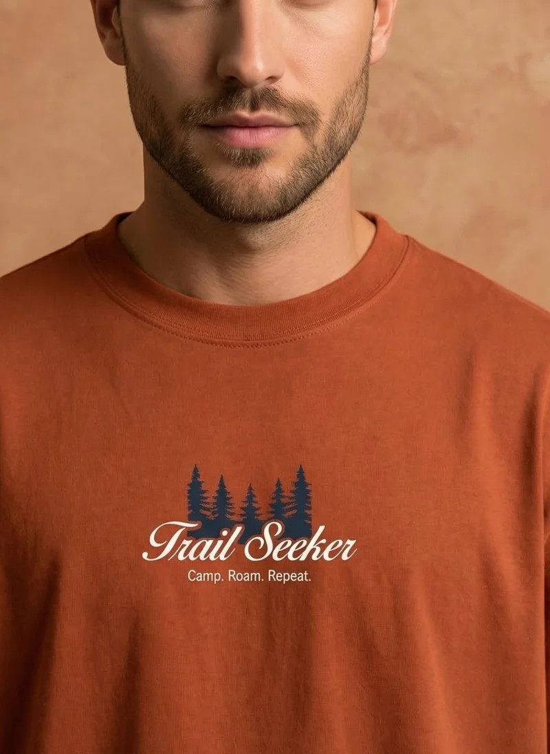 NOBERO Rust Orange Men Oversized Graphic Printed T-shirt for Men | Best Price UAE