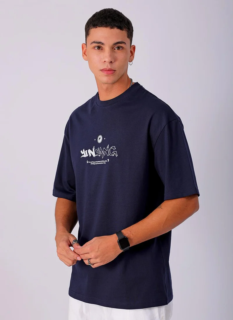 ذا انديان كراج كو Men Boxy Oversized Graphic Back Printed Round Neck Tshirt