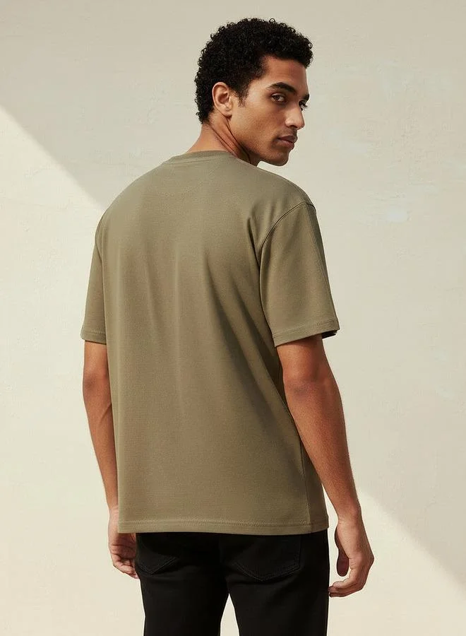 Lee Cooper Brown Lee Cooper Men Regular Fit Crew Neck Short Sleeves Embroidered T-shirt for Men | Best Price UAE