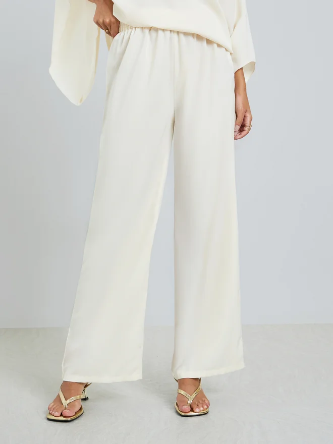 Styli  Styli Cream Flared Sleeve Top and Pants Co-Ords for Women | Best Price UAE