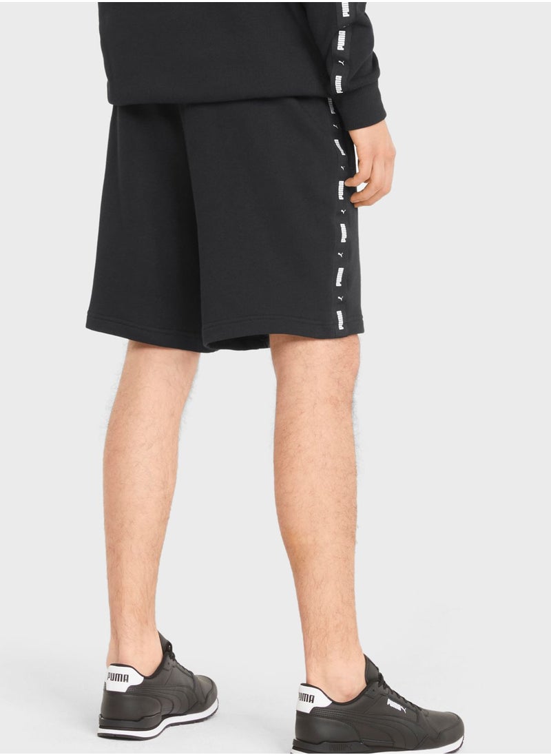 PUMA - 9" Essential Tape Shorts - Image 1