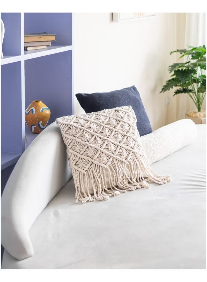 HMK CRAFTS A macramé cushion with a unique geometric design based on precise cross-thread squares, featuring a hidden zipper and high durability for long-lasting use. - Image 1
