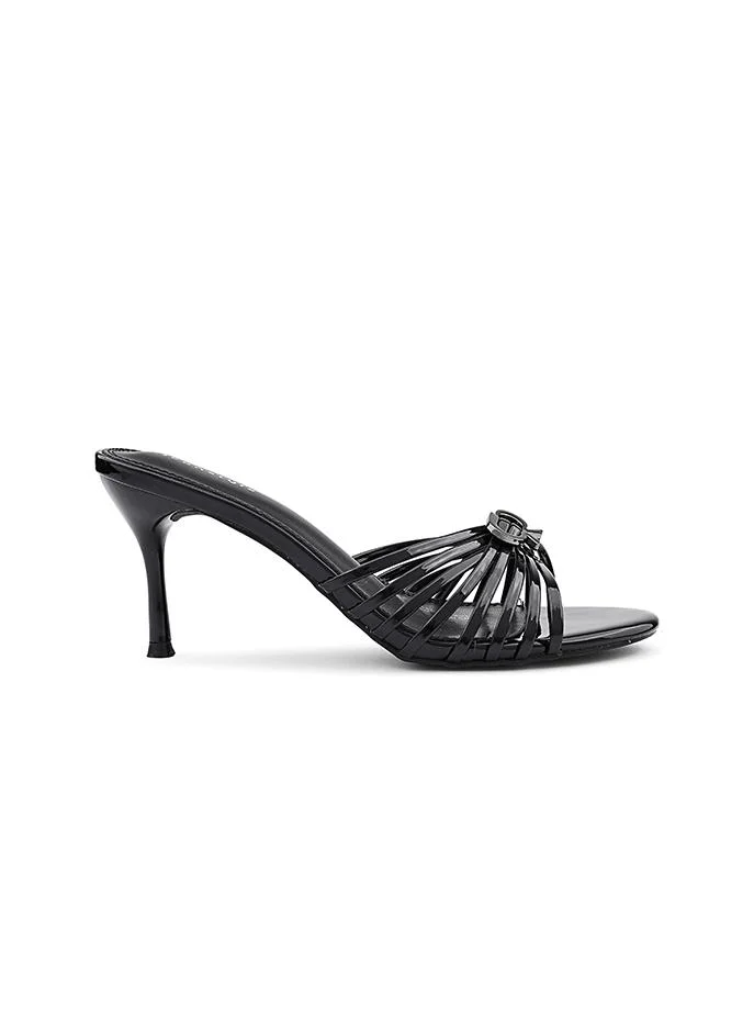 أيقون Slipper decorated with sparkling rhinestone accents.