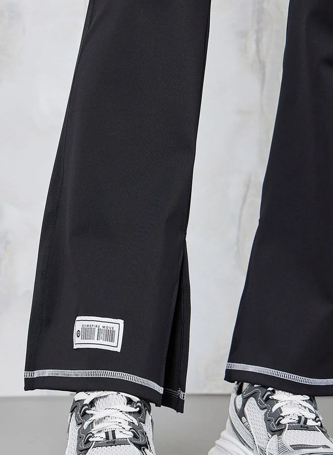 Styli Gymspire Edition - Label Contrast Stitch Detail Inner Side Slit Flared Leggings