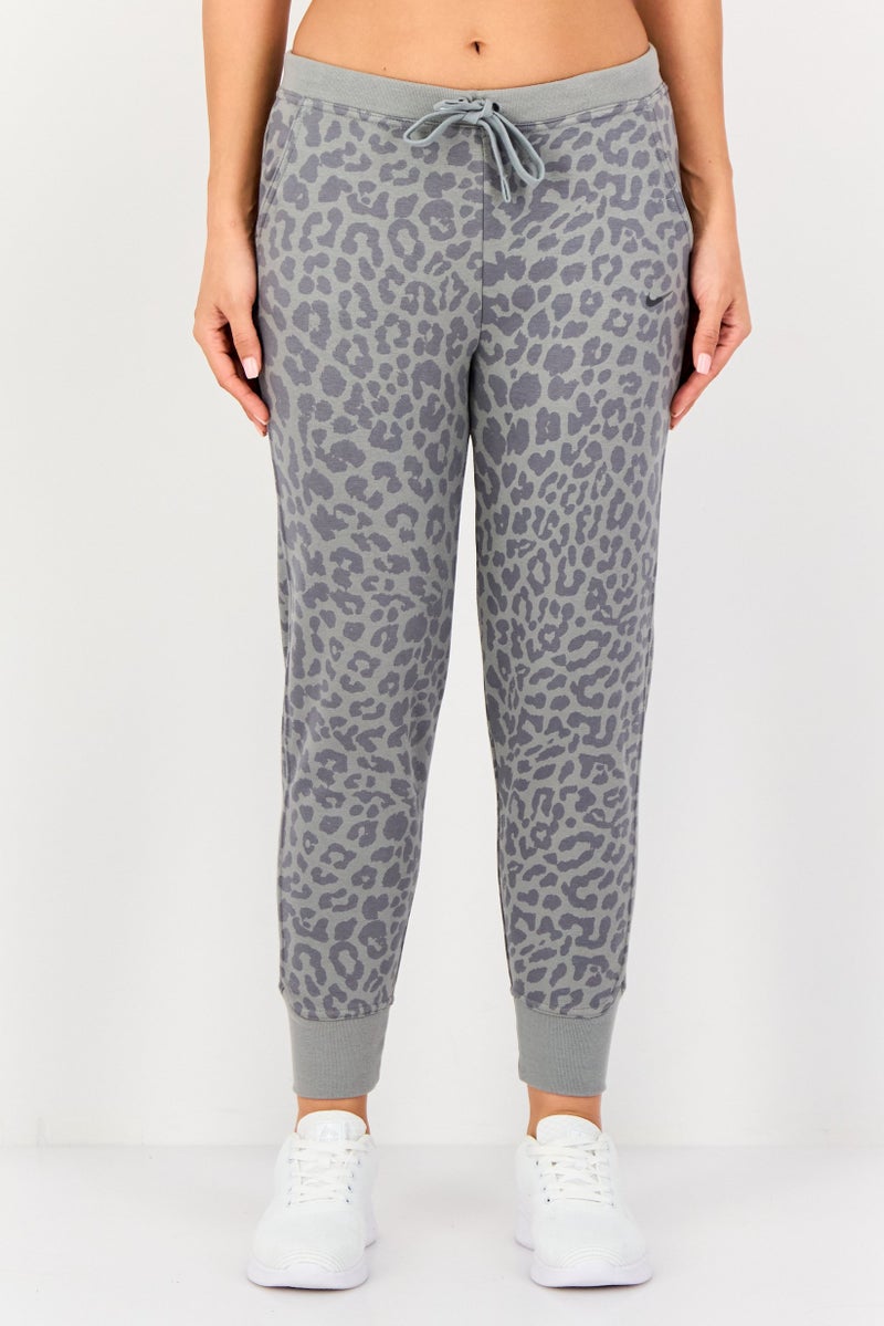 Nike سروال رياضي نسائي بطباعة شاملة لجميع الألوان، متعدد الألوان - Image 1