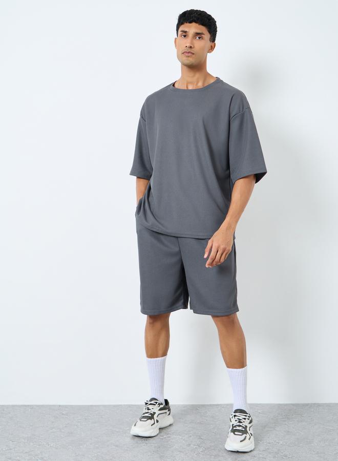 Styli Solid Textured Knit Oversized Streetwear T-Shirt and Shorts Set - Image 1