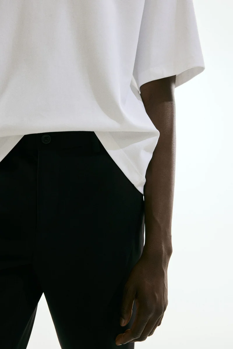 H&M black Slim Fit Cropped trousers for Men | Best Price UAE