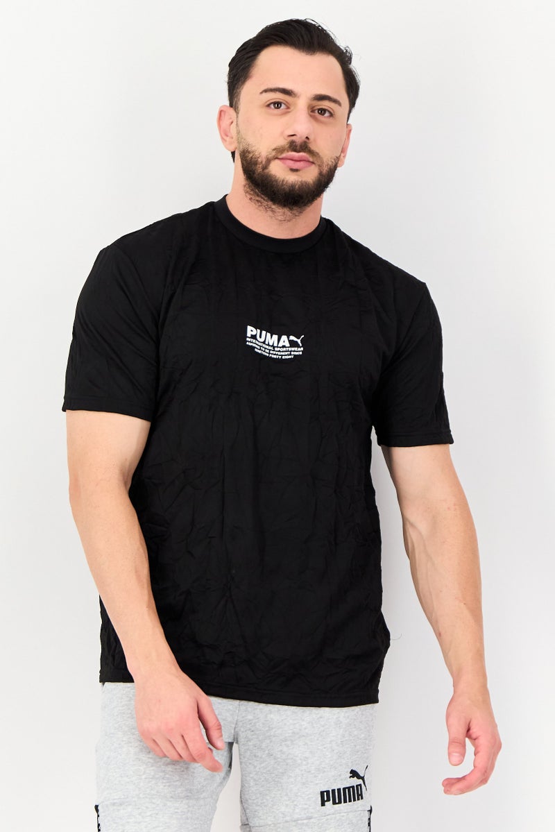 PUMA Men Sportswear Fit Short Sleeve Avenir Crinkle Outdoor T-Shirt, Black - Image 1