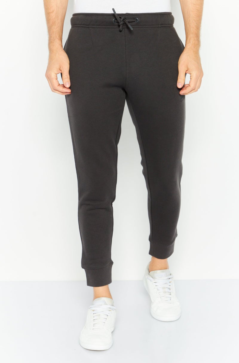 DKNY Sport Men Sportswear Fit Brand Logo Outdoor  Sweatpants, Charcoal - Image 1