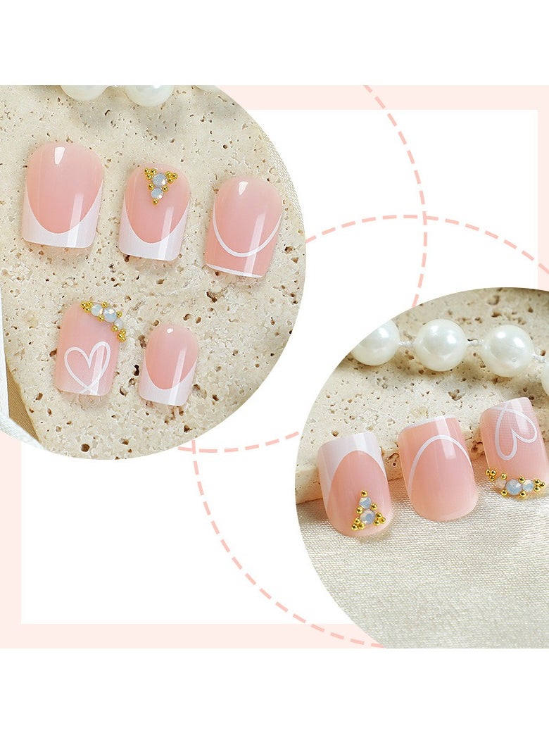 JOSQUEWNN - Press On Nails 24pcs, Valentine's Day New Arrival Medium-Length Duckbill-Shaped, Elegantly Designed with White French Heart Patterns, Nude Nail Tips, Perfectly Showcasing a Romantic Vibe.Suitable for Various Occasions, Fake Acrylic Nails With Glue Kit. - Image 1