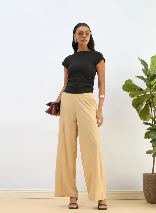 SASSAFRAS SASSAFRAS Black Knitted Short Sleeve Ruched Crop Top