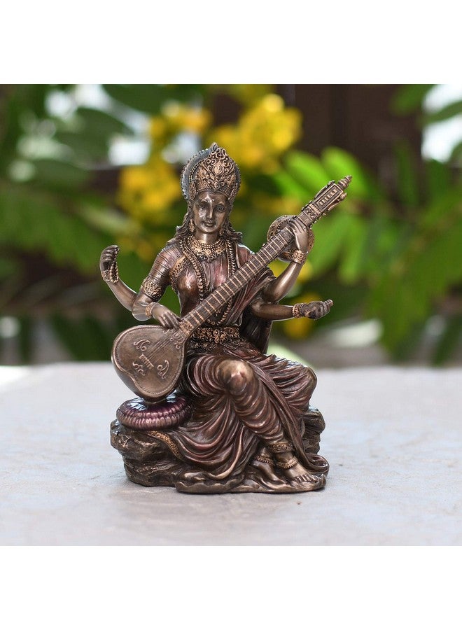 Collectible India Porcelain Saraswati Idol (13.2 cm x 10 cm x 14.4 cm, Bronze) - Image 1