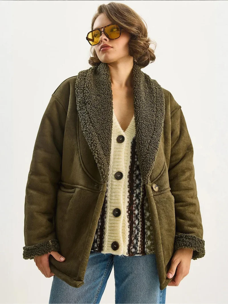 بيانكو لوتشي معطف بأزرار مزين بفرو صناعي من لوتشي