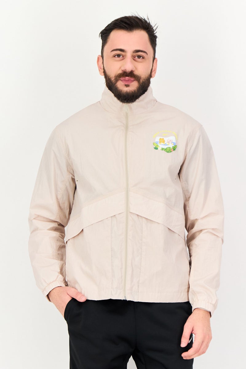 Reebok جاكيت ريبوك × كاكاو فريندز للرجال، ملابس رياضية، بأكمام طويلة، واقي من الرياح، بيج - Image 1