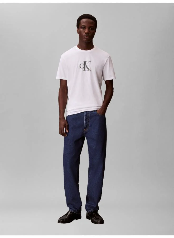 Calvin Klein Jeans  90s Top Stitched Tapered Fit Jeans for Men | Best Price UAE