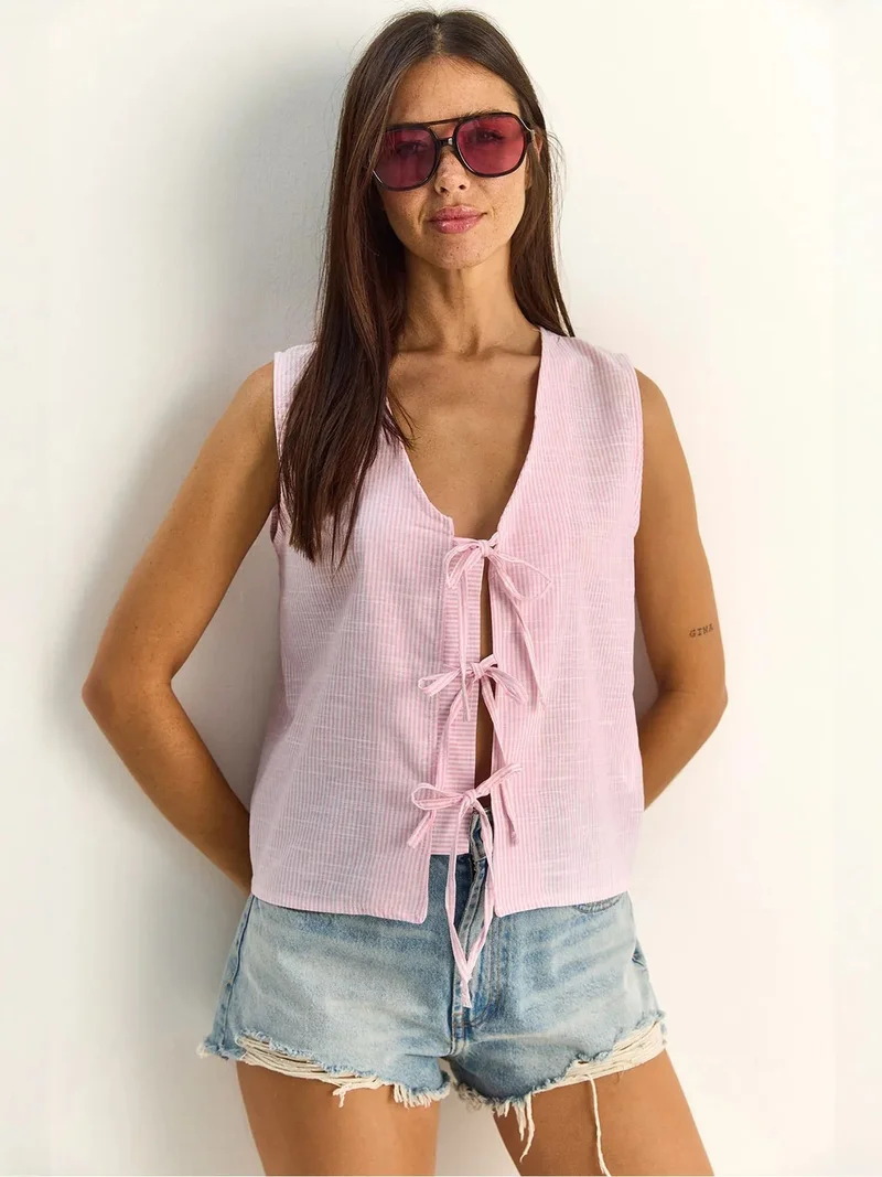 بيانكو لوتشي LUCCI Striped V-Neck Blouse with Tie Detail