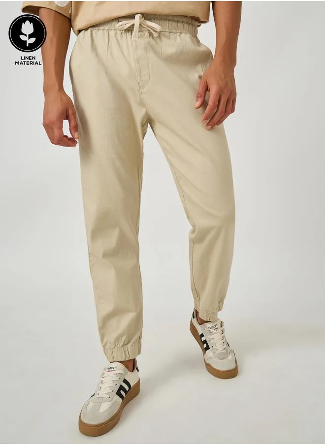 Styli Styli Solid Relaxed Fit Elasticated Cuffed Joggers with Drawstring