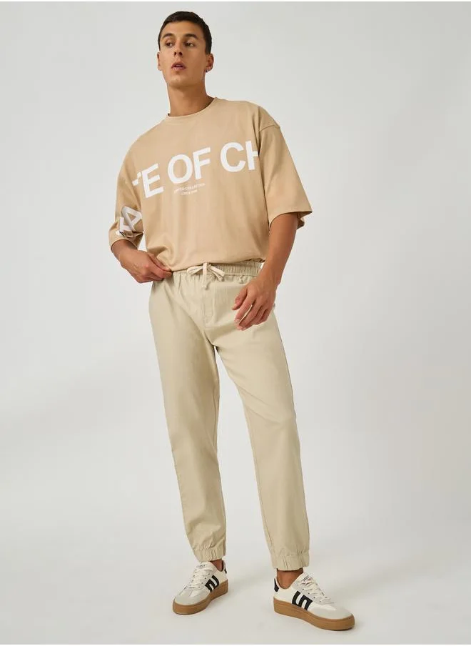 Styli Styli Solid Relaxed Fit Elasticated Cuffed Joggers with Drawstring