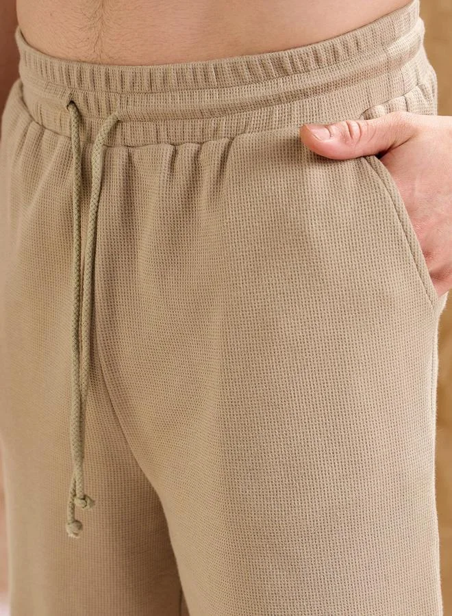 ساسافراس طقم تي شيرت وشورت رجالي ساسافراس كاكي بنقشة الوافل وجيب كبير