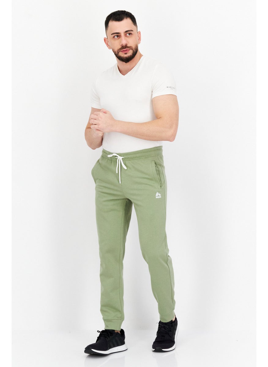 Men Sportswear Fit Training Sweatpants, Olive - pzsku/ZAA2BFC8DF5DAA3F39E3CZ/45/_/1724351042/98eef9a1-29f9-436f-bb24-7c72b49a7075