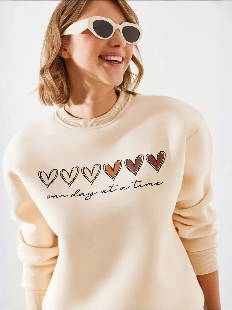 Bianco Lucci LUCCI Heart Patterned Crew Neck Sweatshirt
