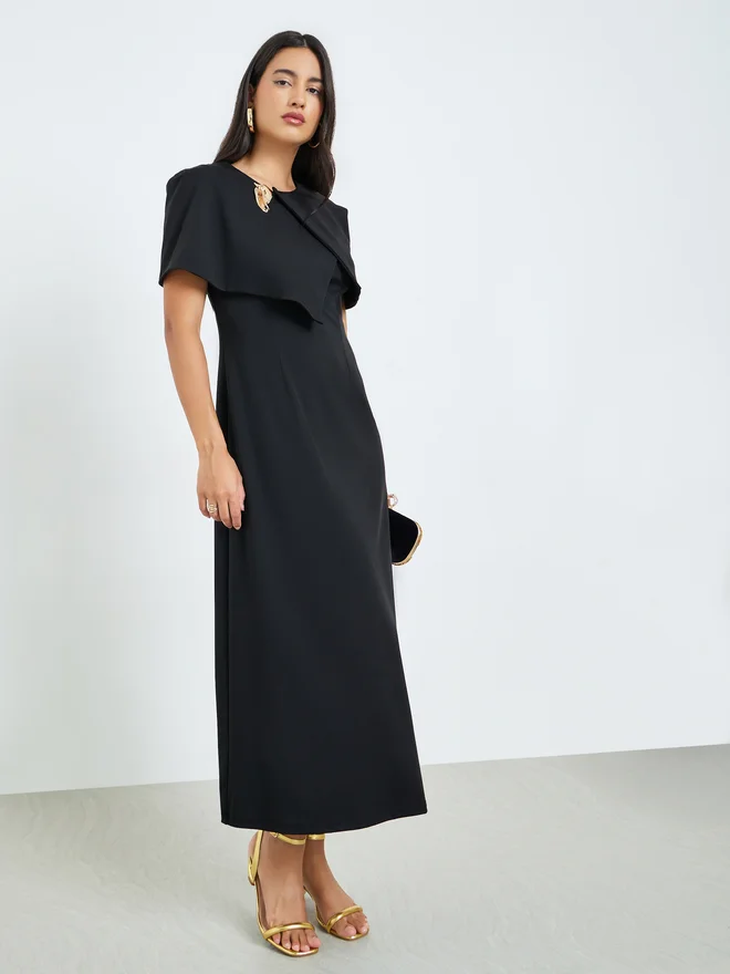 Styli Styli Black Cape Style Midi Dress with Brooch Accent