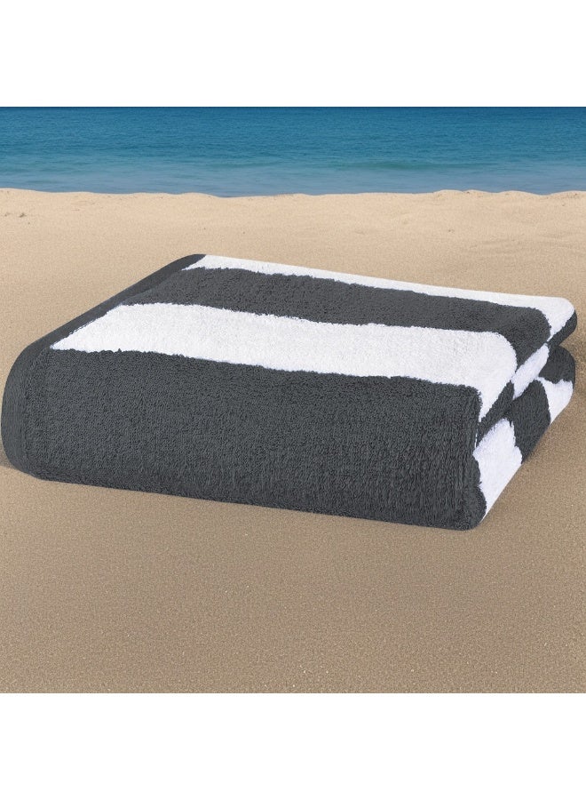 فابينني عبوة من منشفتين شاطئيتين قطنيتين 100%، مقاس 30×60 بوصة، بنمط مخطط، مناسبة لحمامات السباحة، مصنوعة من القطن، مقاس 76×152 سم، تتميز بقدرة امتصاص عالية وسرعة جفاف فائقة، لون رمادي داكن. - Image 2