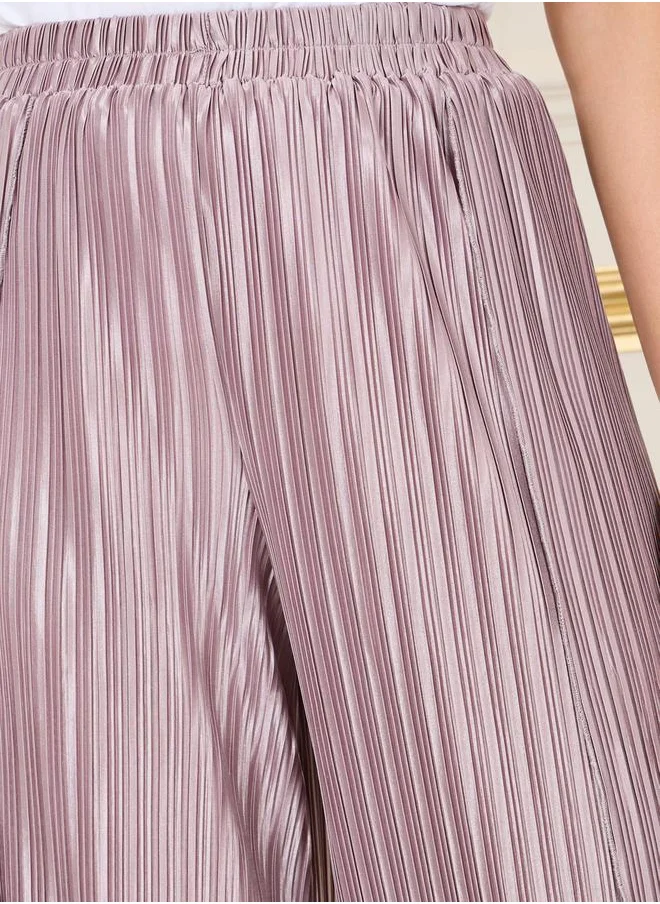 ستايلي Plisse Asymmetric Hem Relaxed Pants