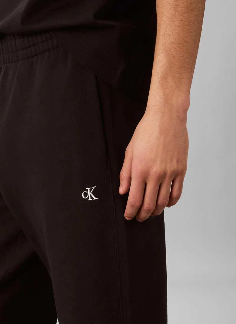 Calvin Klein Jeans black Cuffed Hem Drawstring Sweatpants for Men | Best Price UAE