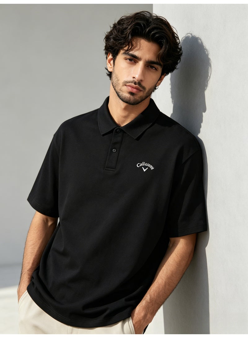 Callaway Men’s Black Solid Short Sleeve Golf Polo Shirt with White Printed Chest Logo - Image 1
