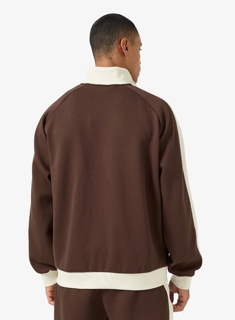 كارل كاني جاكيت رياضي مخطط بتوقيع بيكيه