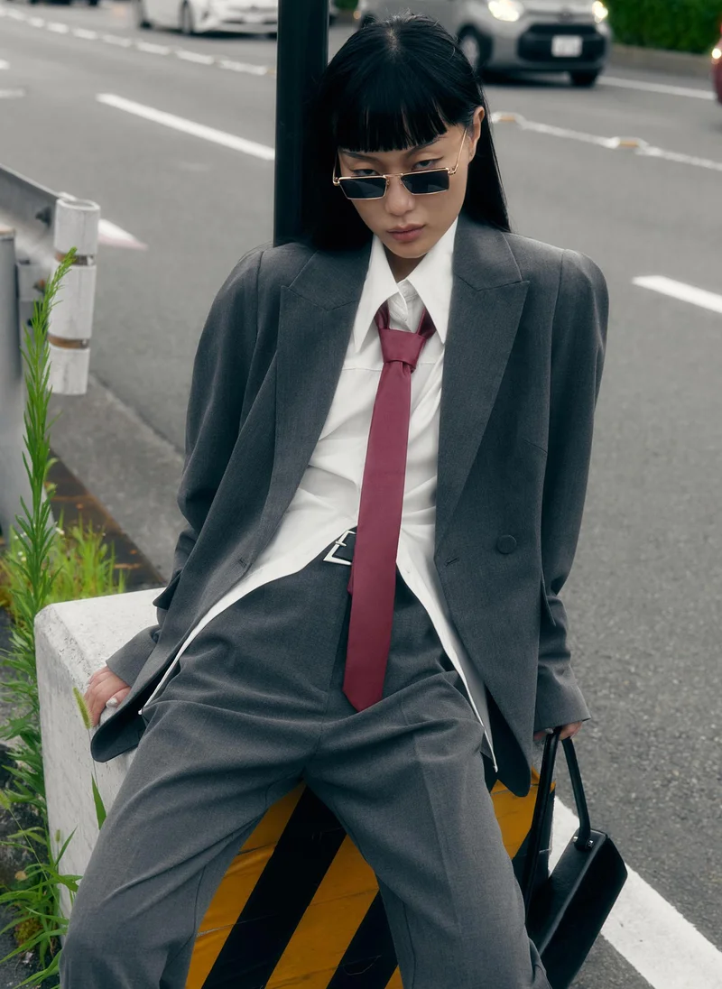Flared jacket with voluminous sleeves