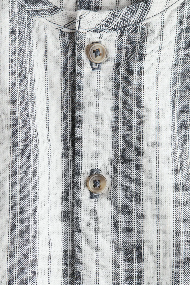 H&M Sleeveless linen romper suit