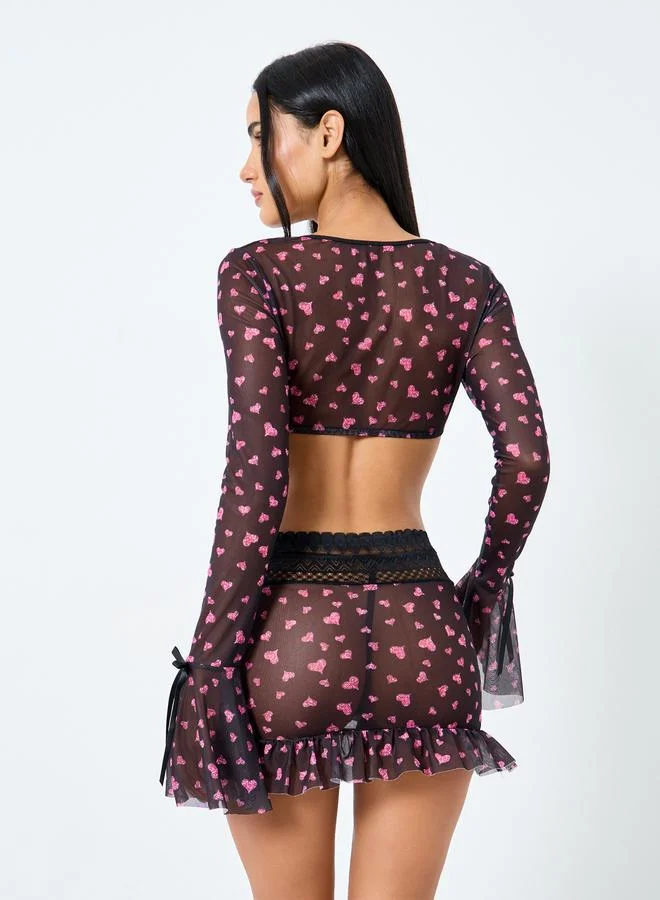 Styli Styli Pack of 3 - Heart Print Long Sleeves Bra Top, Lace Panel Skirt and Thong
