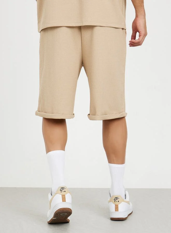Styli Waffle Knit Oversized Shorts with Turn Up Hem & Badge Detail