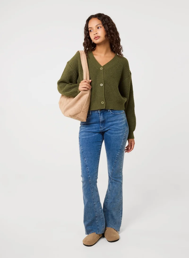 بينك فانيلا كارديجان قصير بأزرار