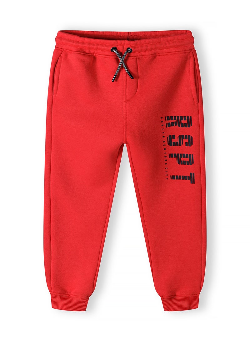 MINOTI Kids Boys' Joggers With Drawstring Waist, Side Pockets and Print Detail - Image 1