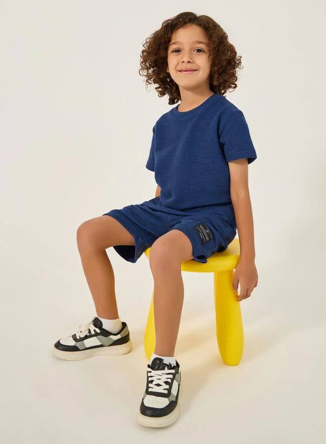 Styli Styli Textured T-Shirt with Badge Detail and Shorts Set
