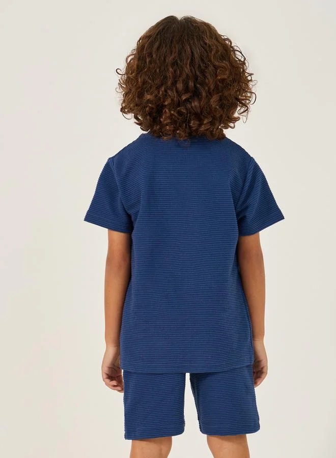 Styli Styli Textured T-Shirt with Badge Detail and Shorts Set