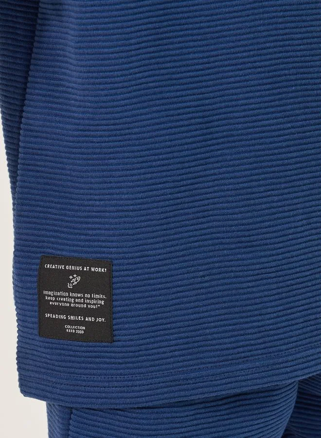 Styli Styli Textured T-Shirt with Badge Detail and Shorts Set