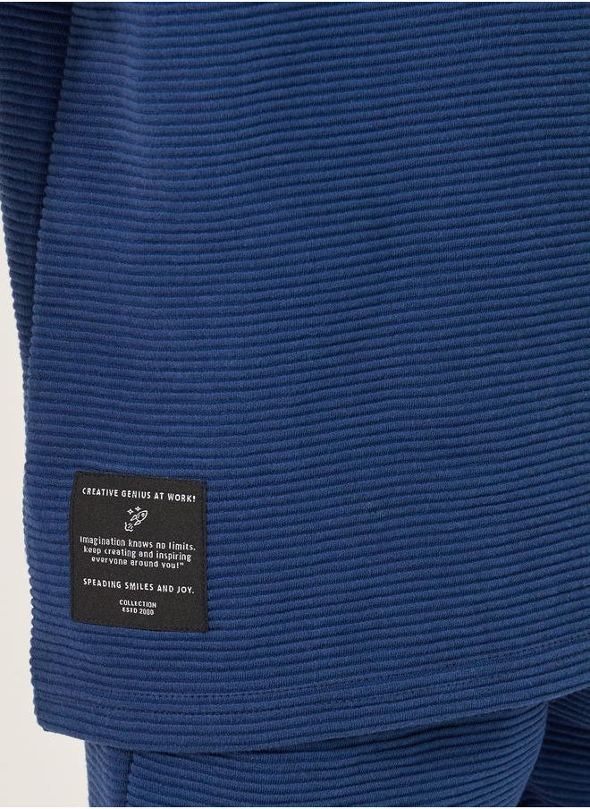 Styli Styli Textured T-Shirt with Badge Detail and Shorts Set  - Image 4