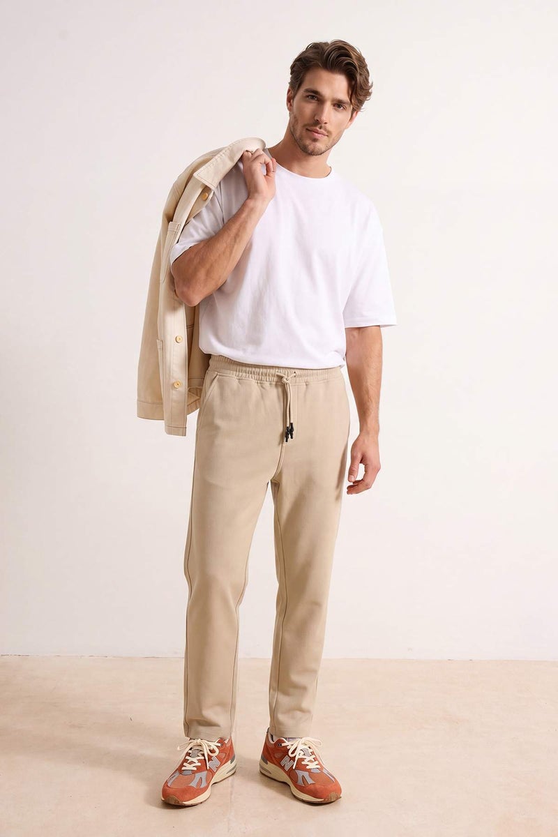 trendyol Beige Regular Elastic Waist Jeans Loose Denim Pants Tmnaw24Je00025 - Image 1