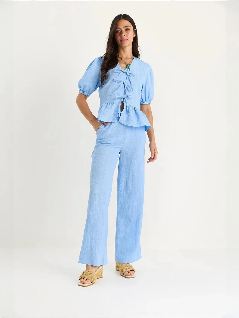 بيانكو لوتشي طقم قطعتين برقبة على شكل حرف  بنقوش