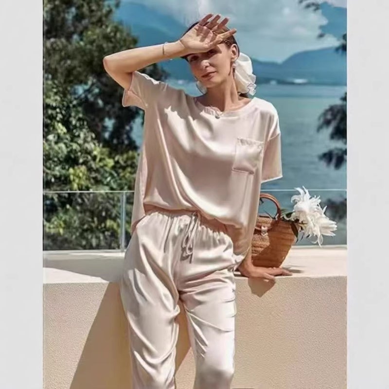 Women's Loose Fit Two-Piece Tracksuit Set (Short Sleeve Top + Capri Pants) - Image 3